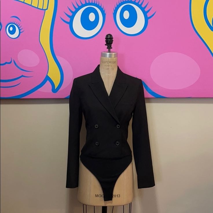 This Is A First - A Tuxedo Style Jacket Bodysuit! Love This Concept. Pair With High Waist Pants And Ankle Boots For A Finished Look. Collection: 08 Season: A/W Year: 2020 Size S Across Chest - 17 1/2 In. Across Waist - 14 In. Shoulder To Crotch - 30 In. Shoulder To Cuff - 24 In. Shoulder To Shoulder - 14 In. Material: Polyester / Viscose Blend Made In Morocco We Have Matching Pants Listed Also Black Long Sleeve Bodysuit For Formal Occasions, Black Long Sleeve Formal Bodysuit, Formal Black Long Sleeve Bodysuit, Zara Tailored Notch Lapel Pantsuit, Double-breasted Fitted Pantsuit For Fall, Zara Tailored Long Sleeve Suits, Zara Fitted Blazer For Business, Fitted Outerwear With Suit Collar For Night Out, Fitted Long Sleeve Pantsuit For Night Out