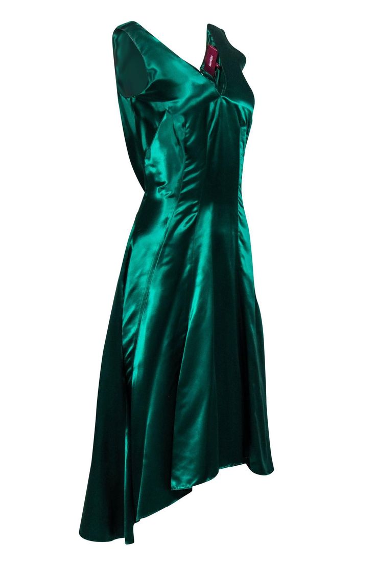 Look sleek and sexy this holiday season in a stunning Sies Marjan dress! An elegant option for a formal event or holiday cocktail party, this shimmering satin beauty will turn-heads with its gorgeous emerald green hue and elongated darts. Show off this midi's flattering high-low design with a pair of strappy metallic heels and plenty of gold jewelry. Size 4 100% Viscose Concealed back zipper V-neckline High-low hem Small snag on back near bottom Blemish at v-neckline Bust 32" Waist 30" Shoulder Sleeveless Satin Evening Dress For Party Season, A-line Party Dress With Bias Cut, Elegant Green A-line Satin Dress, Holiday A-line Evening Dress With Fitted Bodice, Satin A-line Strapless Dress For Party, Elegant Silk Satin Dress For Prom Season, Sleeveless Satin Evening Dress For Prom, Elegant Sleeveless Satin Prom Dress, Satin Evening Dress With Fitted Bodice For Cocktail