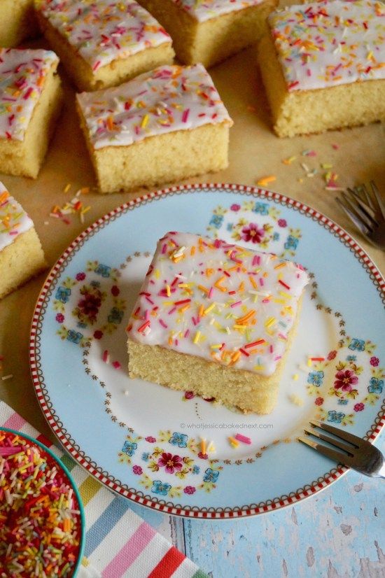 a plate that has some kind of cake on it with sprinkles around it