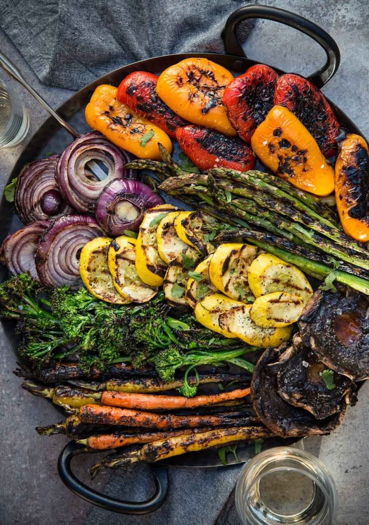 a platter with grilled vegetables on it