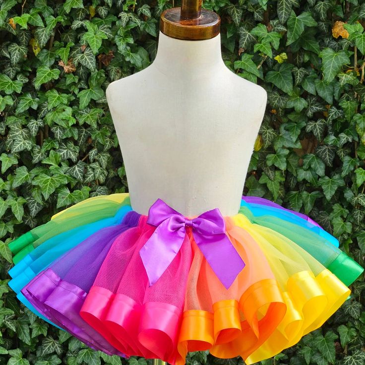 This Cocomelon Tutu Set is perfect for your child's next birthday. Featuring a soft cotton shirt printed with the beloved Cocomelon characters, plus a colorful rainbow tutu, this outfit is sure to be a hit. Whether for a party, dress-up day, or photo shoot, your little one will love this fun and festive ensemble. Multicolor Sweet Tutu Dress For Summer, Sweet Multicolor Tutu Dress For Summer, Fun Summer Tutu Dress For Birthday, Fun Multicolor Summer Tutu Dress, Multicolor Tutu Dress For Spring Party, Whimsical Multicolor Tutu Dress For Spring, Fun Pink Tutu Dress For Summer, Sweet Multicolor Tutu Dress For Spring, Playful Cotton Tutu Dress For Spring