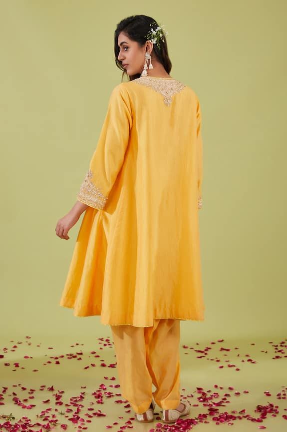 Yellow flared sleeves anarkali with persian bloom yoke embroidery using gota, moti sequins and zari nakshi highlights. Paired with a salwar and scallop moti border peach organza dupatta. - Aza Fashions Elegant Mulmul Churidar For Diwali, Anarkali Cambric Traditional Wear With Zari Work, Anarkali Traditional Wear With Zari Work On Cambric, Anarkali Raw Silk Lawn Suit With Long Sleeves, Anarkali Long Sleeve Lawn Suit In Raw Silk, Anarkali Style Traditional Wear In Cambric With Dabka Work, Designer Wear Cambric Sharara For Diwali, Bollywood Cotton Silk Dress With Dabka, Wedding Anarkali Set With Zari Work In Cambric