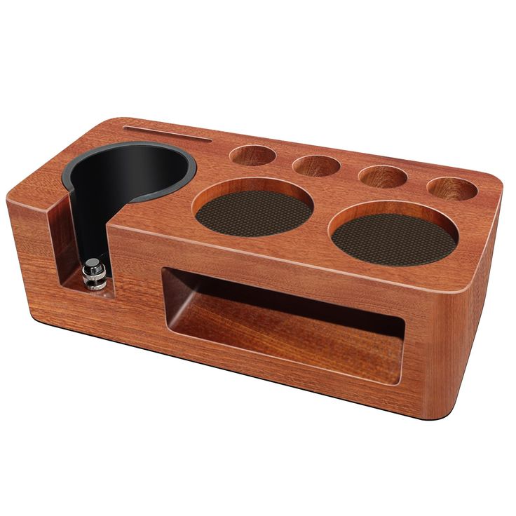 a wooden speaker holder with two speakers on it's sides and one in the middle