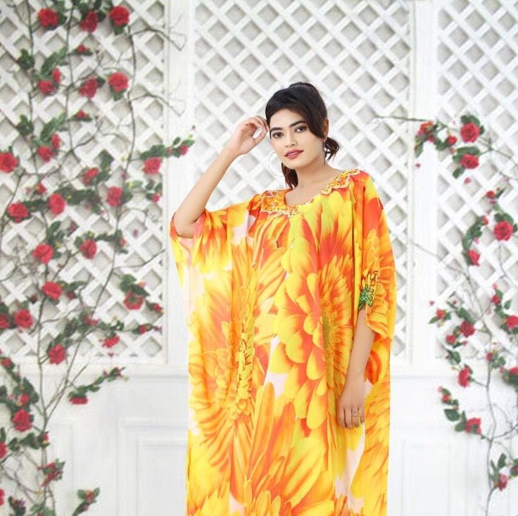 "Beautiful immense Sun flowers printed on this silk kaftan intensify this kaftan. The Sunflower print is so attractive that rarely requires ornamental embellishment on it, though it looks great with small crystals near round neck of it. The look at the sides of it perfectly goes with the sunny day lights of summer. Chilling with this kaftan near beach gives you relief from the heat... ONE SIZE FIT ALL Beautiful hand embroider kaftans made with Rich quality of fabric & hand crafted by Skilled Sequin Kaftan, Silk Kaftan Dress, Summer Kaftan, Silk Yellow Dress, Short Kaftan, Small Crystals, Resort Wear For Women, Sun Flowers, Kaftan Maxi Dress