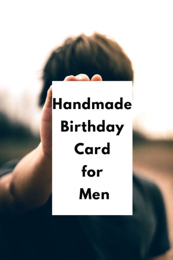 a person holding up a card with the words handmade birthday card for men