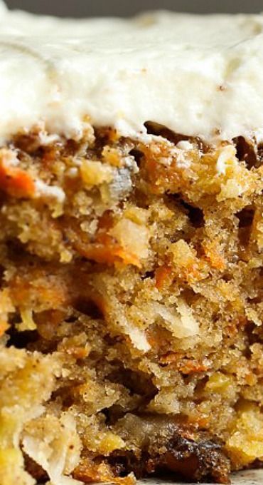 a piece of carrot cake with cream cheese frosting