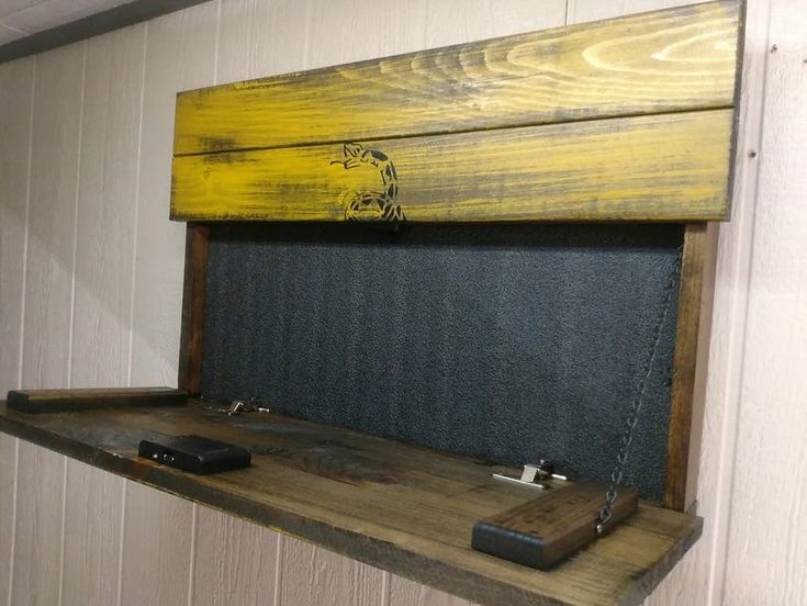 a wooden shelf with a blackboard on it