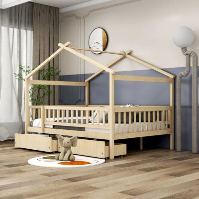 a child's bedroom with a wooden bed frame and mattress in the shape of a house