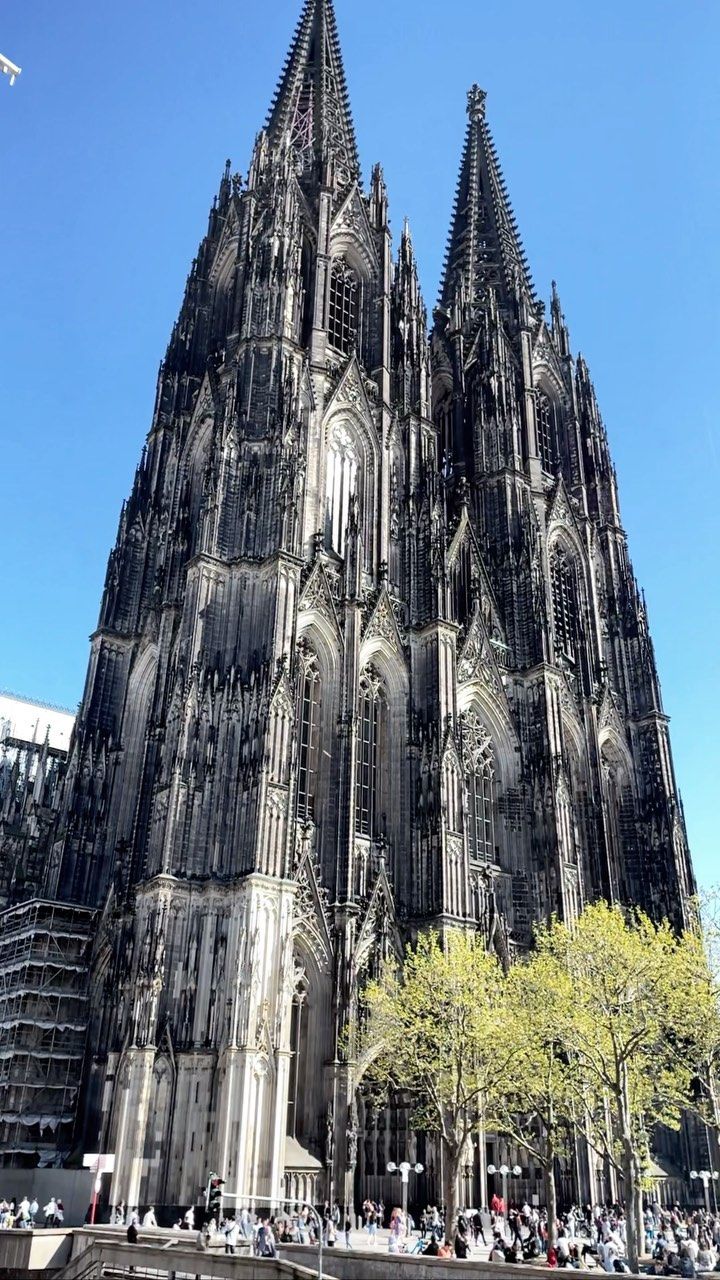 the large cathedral has many spires on it's sides