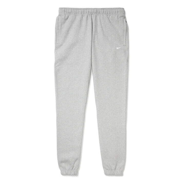 Nike Casual Sweats For Streetwear, Nike Comfortable Joggers For Sports, Nike Casual Streetwear Sweats, Nike Sportswear Sweatpants For Jogging, Nike Joggers With Ribbed Waistband For Jogging, Nike Sporty Leisure Sweatpants, Casual Fleece Joggers For Sports Season, Nike Fleece Sweatpants With Ribbed Cuffs, Nike Relaxed Fit Sweatpants For Streetwear