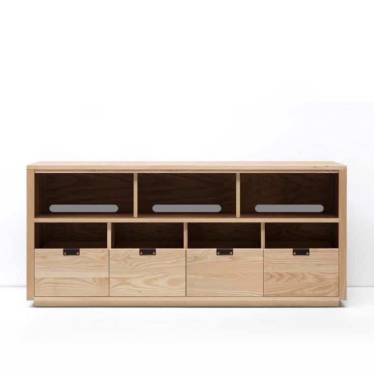 a wooden shelf with four drawers and two doors