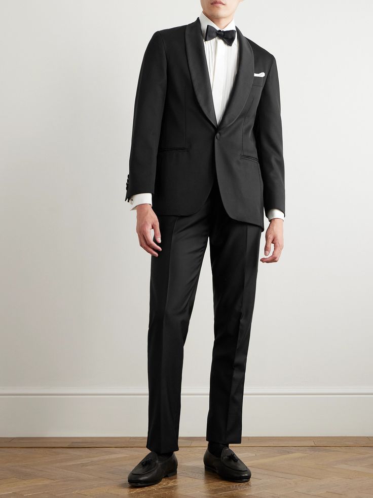 Rubinacci's tuxedo jacket is modelled after a style from the 1930s. Tailored from pure wool and fully lined in lustrous satin, it's framed with a grosgrain shawl collar and has covered buttons jacquard-woven with a checked pattern. Classic Fitted Double Breasted Suit For Evening, Classic Fitted Evening Suit, Evening Double Breasted Suit With Pressed Crease, Elegant Fitted Double Breasted Evening Suit, Tailored Tuxedo With Pressed Crease For Evening, Fitted Tuxedo Outerwear With Welt Pockets, Tailored Double Breasted Suit With Hidden Buttons For Evening, Formal Fitted Single Breasted Tuxedo, Evening Tailored Double Breasted Suit With Pressed Crease