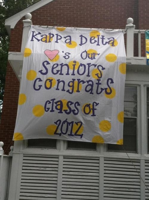 a sign that says kapa delta is our senior's congrats class of 2012