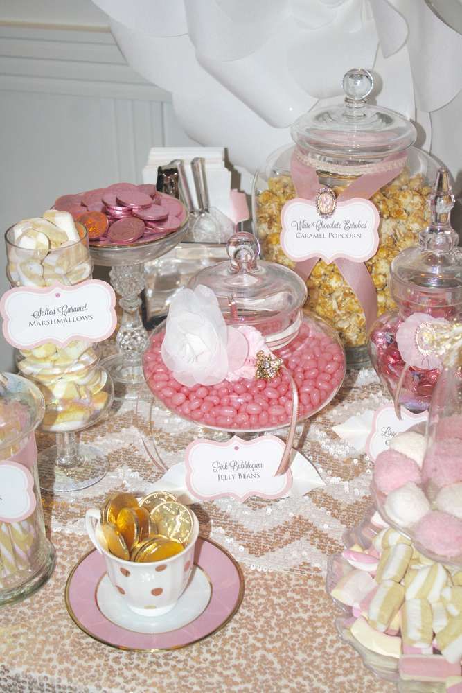 pink and white dessert table with princess theme