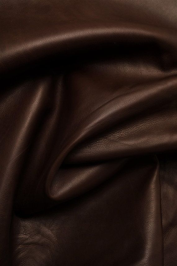 a close up view of a brown leather material