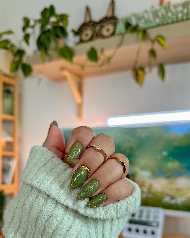 Gave my nail artist a little challenge with these nails but I loved the end result 🌿🍃 Legend of Zelda inspired nails because it has become my favorite video game series, I want to live inside the world. My first Zelda game was Breath of the wild and I’m currently playing TOTK and now I want to go back and play all of the old games 🥰 Zelda Game, I Want To Live, Inspired Nails, Nail Art Videos, Nail Jewelry, Old Games, Breath Of The Wild, Nail Artist, Legend Of Zelda