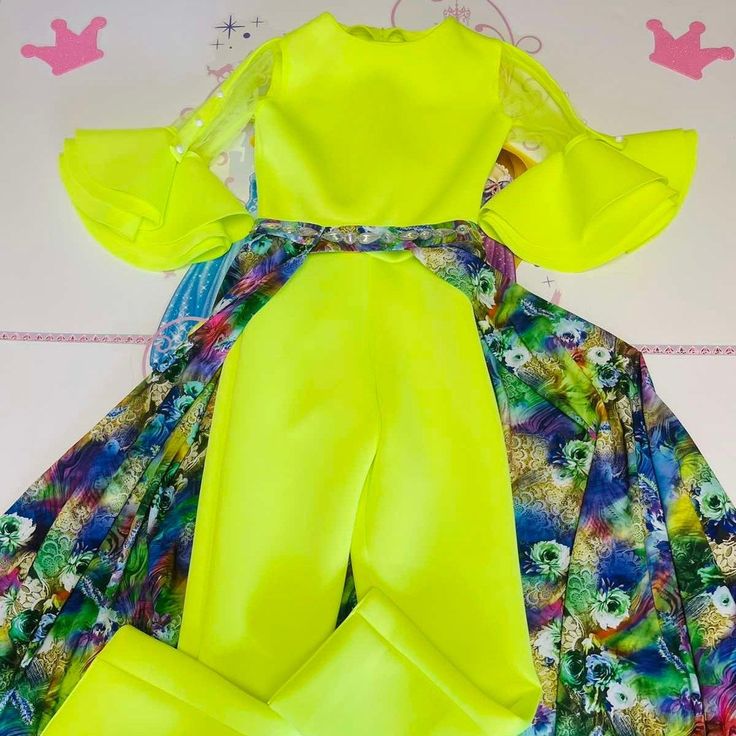 "Gorgeous neon yellow jumpsuit, romper with unique 3 layers sleeves , ruffles and multi color print waist cape. Zipper back. This outfit would be perfect for all important events such as Birthday, Party, Pageant, photo session. Ready to ship in size 12-14 ( chest 32 waist 26 length from shoulder to bottom of the pants 51,5\") Materials: neoprene, chiffon. Colors and sizes. This outfit can be made in any color from neoprene color chart and size. Message me and I'll happily send you a color chart. Fitted Yellow Jumpsuits And Rompers For Party, Yellow Jumpsuits And Rompers For Spring Party, Yellow Long Sleeve Party Set, Yellow Fitted Jumpsuits And Rompers With Ruffles, Fitted Yellow Jumpsuit For Party, Fitted Yellow Ruffle Jumpsuits And Rompers, Yellow Bubble Romper For Summer Playwear, Yellow Casual Bubble Romper For Playtime, Cute Fitted Yellow Bubble Romper