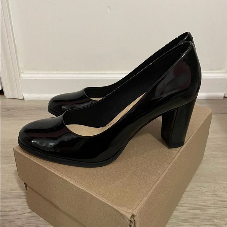 Size 7.5 Brand New With Box! Approximately 3 Inch Heels Black Block Heels With 4-inch Heel For Office, Black Patent Leather Block Heels For Work, Office Black Block Heels With Branded Heel Counter, Black Block Heels With Sculpted Heel For Office, Office Black Block Heels With Sculpted Heel, Black Patent Leather Block Heels With 4-inch Heel, Black Block Heels For Work With Durable Heel, Black Block Heels For Work With Round Toe, Black Almond Toe Block Heels For Party