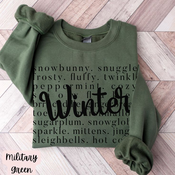 Cozy Up with Winter Wisdom: Our Winter Sayings Sweatshirt/Hoodie Embrace the chill of the season with our Winter Sayings Sweatshirt or Hoodie, designed to keep you warm while spreading the cozy vibes of winter. Whether you're snuggled by the fireplace or out enjoying a snowy day, this piece is perfect for celebrating the beauty and wonder of the colder months. Why You'll Love This Sweatshirt/Hoodie: Premium Comfort: Made from a high-quality blend of cotton and polyester, this Gildan 18000 sweats Comfy Winter Sweater For Cold Weather, Comfy Crew Neck Winter Sweater, Winter Fleece Sweatshirt With Letter Print, Winter Letter Print Fleece Sweatshirt, Winter Fleece Sweater With Letter Print, Comfortable Green Winter Sweater, Winter Hoodie Sweater With Letter Print, Casual Christmas Sweater For Cold Weather, Green Fleece Sweatshirt For Winter