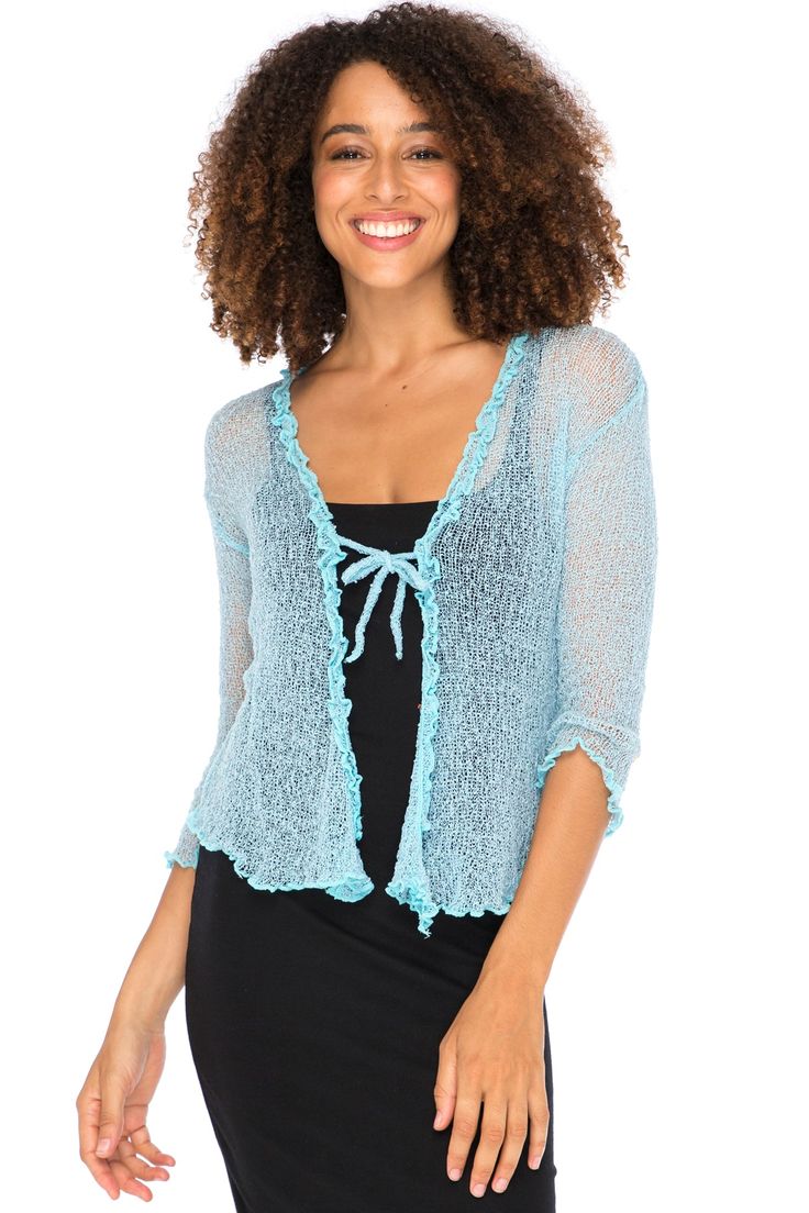 The cardigan to love for the frill of it! This gossamer mesh-like aqua knit cover up is as feminine as it is fun - a beautiful lightweight layer that dresses up casual looks or adds just a touch of coverage over revealing summer styles. Super-stretchy viscose creates a comfortable fit and never wrinkles, scrunching easily into your purse or carryon for travel or vacation. Naturally ruffled sleeves complement a full ruffle front that you can tie closed with the attached string or leave open in a pretty cascade. Back From Bali is dedicated to creating beautiful, quality clothing with a heart. All of our items are crafted, sewn and painted by hand in Bali, by local artists and women who own small home businesses. For over 20 years, we have nurtured fair, honest and caring relationships with o Shrug For Women, Sheer Shrug, Sweater Shrug, Dress Cardigan, Bolero Cardigan, Sheer Sweater, Bolero Shrug, Low Cut Dresses, Loungewear Dresses