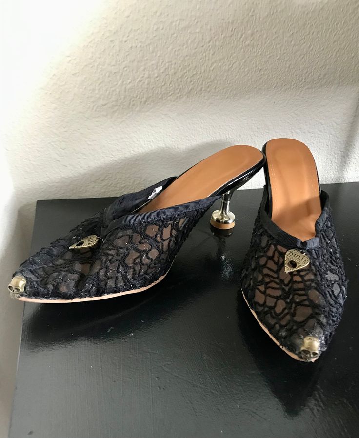 size 7 (38) women's slip-on mule shoes with small heel and a witchy flair Pointed Toe Mules With 4-inch Heel For Night Out, Party Heels With Sculpted Heel And Slip-on Design, Party Closed Toe Mules With 4-inch Heel, Party Mules With 4-inch Pointed Heel, Pointed Toe Mules With 4-inch Heel For Party, Formal Slip-on Mules With Wrapped Heel, Formal Wrapped Heel Slip-on Mules, Party Mules With Round Toe And Wooden Heel, Party Mules With Wooden Heel And Round Toe