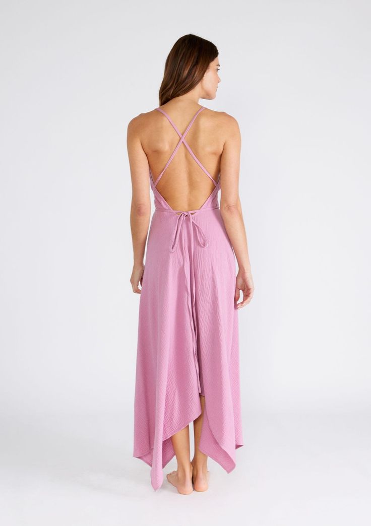 Freshen up your warm-weather wardrobe with our versatile halter neck beach dress in a breathable cotton gauze fabrication. This show-stopping style features a plunging v-neckline and a handkerchief hemline. The long straps can be tied in multiple ways, making it the most versatile dress in your closet. Airy cotton gauze Sleeveless Maxi length Handkerchief hemline V-neckline Halter neck Open back Cross back detail Long straps can be tied in multiple ways Model is 5'9, wearing a size S/M.Style: I-70552W-RJZ Vacation Dresses Beach, Paradise City, Cotton Gauze Fabric, Blue Orchids, Black Halter Dress, Halter Maxi, Gauze Fabric, Halter Maxi Dresses, Vacation Dresses