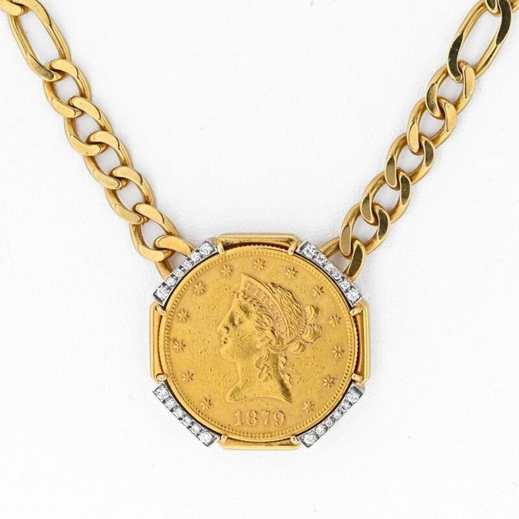 Capture the essence of elegance and history with the David Webb Platinum & 18K Yellow Gold Liberty Head Coin Necklace. This exquisite piece showcases a U.S. $10 coin, featuring the iconic Liberty Head on the front and a majestic eagle on the reverse. To add a touch of sparkle and brilliance, round diamonds delicately accent the coin, creating a stunning contrast against the precious metals.Crafted with meticulous attention to detail, this necklace is a true testament to David Webb's exceptional Luxury Collectible Medallion Necklace, Collectible Coin-shaped Elegant Necklace, Luxury 14k Gold Engraved Coin Necklace, Luxury Engraved 14k Gold Coin Necklace, Elegant Medallion With Figaro Chain Jewelry, Elegant Medallion Jewelry With Figaro Chain, Elegant Jewelry With Figaro Chain And Medallion, Luxury Medallion Necklace For Formal Occasions, Classic 14k Stamped Coin Jewelry