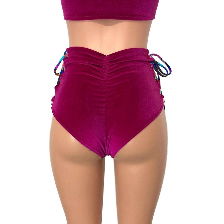 Our classic high waist hot pants with scrunch ruching detail in back to offer a "cheekier" look AND Lace-up sides! These hot pants are made of stretchy fuchsia velvet with splatter print ties and sit high on your natural waist. The lace-up sides make these more adjustable to fit you even better. Wear as a bikini bathing suit bottom, panties, rave shorts, etc. They have a built in liner and are made to be flattering to your figure. Beach Bottoms With Ruched Sides, Solid Color Beach Bottoms With Ruched Sides, Fitted Ruched Tie-side Bottoms, Fitted High Waist Purple Shorts, High Waist Stretch Bottoms With Drawstring, Ruched Tie-side Solid Bottoms, Solid Ruched Tie-side Bottoms, Fitted High Waist Bottoms For Pool, Fitted High-waisted Shorts For Beach