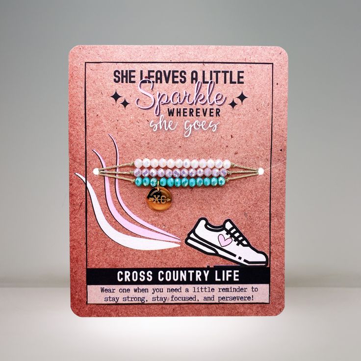 the cross country life bracelet is on display in a pink card with an image of a shoe