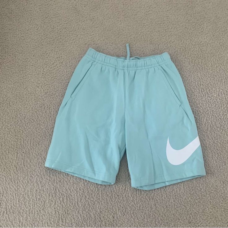 Teal Nike Shorts Never Worn Casual Green Nike Activewear, Nike Bottoms For Spring Loungewear, Blue Cotton Athletic Shorts For Loungewear, Nike Spring Activewear, Spring Sports Bottoms, Short Shape, Blue Cotton Workout Bottoms, Short Sports Bottoms For Spring, Blue Leisure Athletic Shorts, Athleisure Bottoms With Elastic Waistband In Light Blue