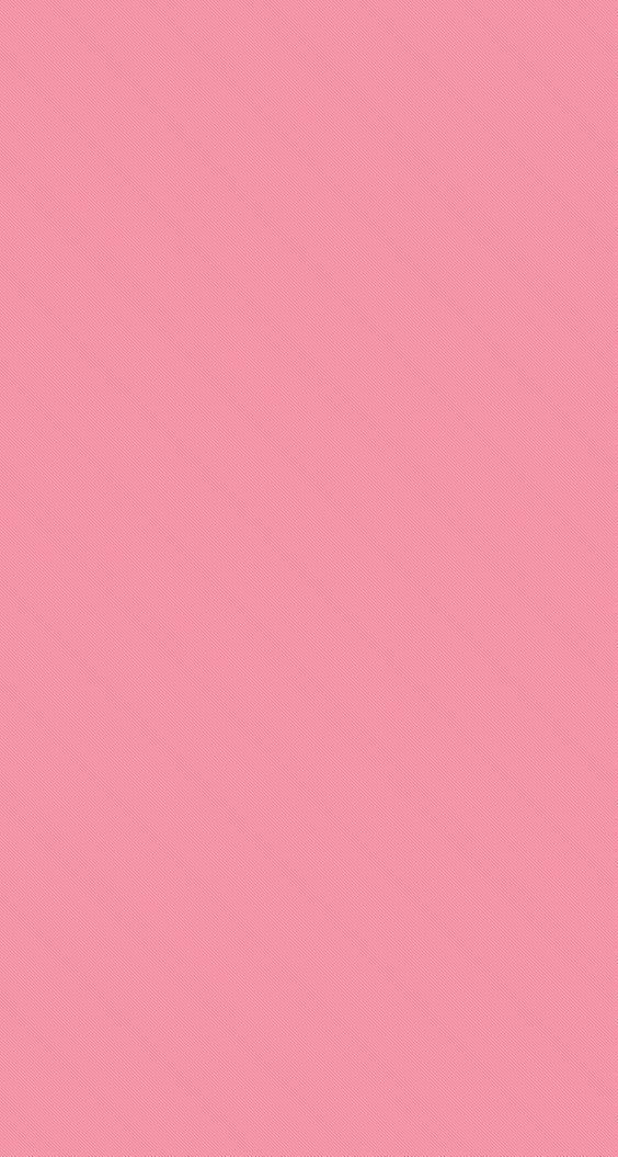 an image of a pink background that looks like it has been painted with different colors