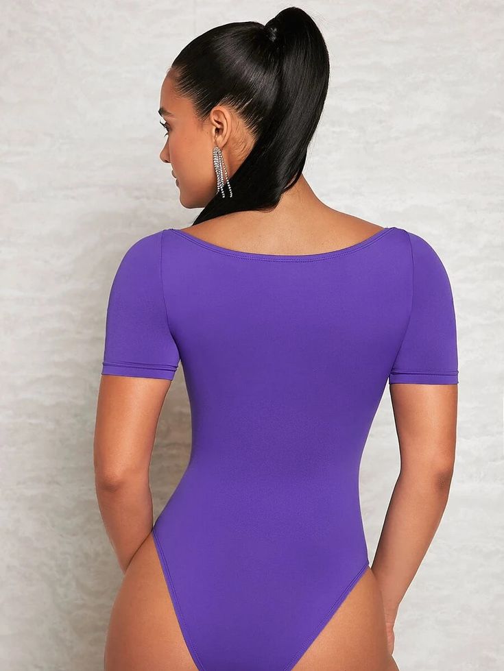 This elegant Twist Front Cut Out Bodysuit is the perfect embodiment of sophisticated style. Featuring a stunning boat neckline and intricately detailed cut-out with a twist front, this slim-fit bodysuit is crafted from a blend of high-stretch knitted fabric and polyester, elastane for luxurious and comfortable wear. Offering a bold splash of color in purple, this one-of-a-kind bodysuit will elevate any look. Specifications: Color: Purple Pattern Type: Plain Type: Other Neckline: Boat Neck Details: Cut Out, Twist Sleeve Length: Short Sleeve Sleeve Type: Regular Sleeve Waist Line: Natural Fit Type: Slim Fit Fabric: High Stretch Material: Knitted Fabric Composition: 94% Polyester, 6% Elastane Care Instructions: Machine wash or professional dry clean Size Chart(cm): Size US Bicep Length Bust C Cut Out Bodysuit, Comfy Jumpsuits, Cutout Bodysuit, Purple Pattern, Boat Neckline, Twist Front, Sophisticated Style, Boat Neck, Color Purple