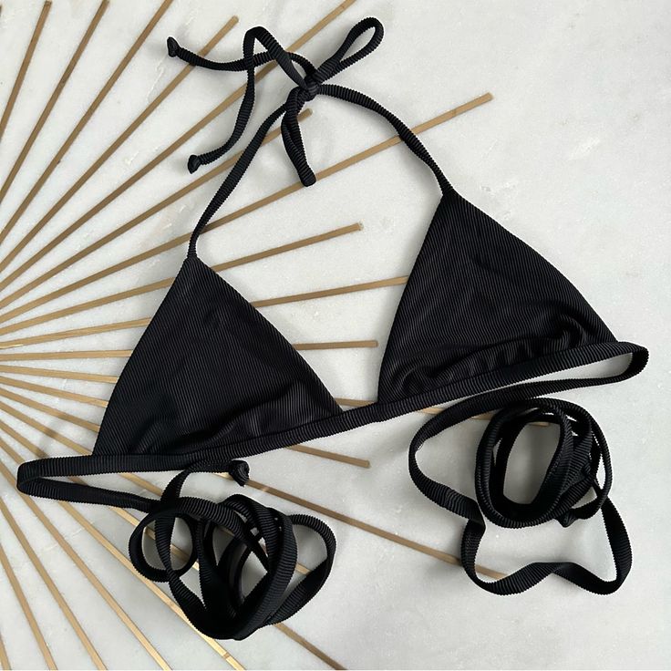 Brand New Never Worn. Brand Marked To Prevent In Store Returns. Black Triangle Top Swimwear For Vacation, Solid Color Triangle Top For Sunbathing, Black Seamless Halter Neck Swimwear, Black Strappy Swimwear For Summer, Summer Black T-back Swimwear, Triangle Top Halter For Beach Season, Black T-back Halter Top For Sunbathing, Bra Friendly Solid Halter Top For Sunbathing, Black Triangle Halter Top For Sunbathing