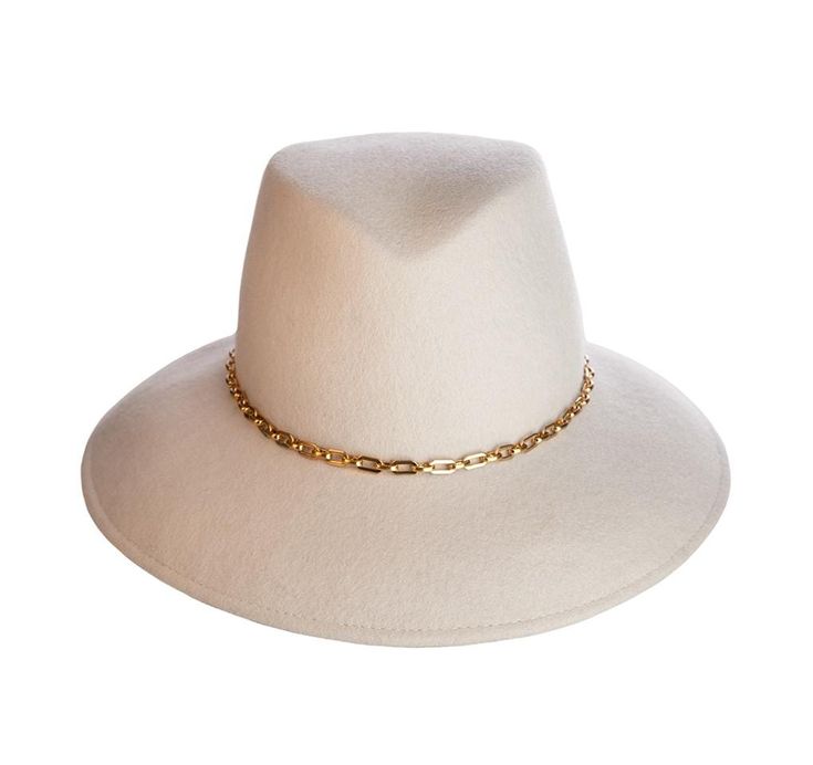 This Eric Javits hand-blocked, water-repellent wool felt fedora is feminized with a curved brim and refined gold plated chain. The elasticized inner band fits most lightweight and Packable. Made in the USA of imported materials. Sustainable wool is shorn and milled from a small farm, multi-use sheep under the most humane conditions. Designed and Handmade in NYC Hand blocked Highest Quality Materials Gold plated chain Classic Gold Flat Brim Hat Band, Classic Gold Fedora With Short Brim, Classic Gold Hat Band For Fedora, Classic Gold Flat Brim Fedora, Classic Gold Fedora With Curved Brim, Elegant Adjustable Gold Fedora, Gold Fedora Hat For Winter, Chic Fur Felt Fedora, Chic Adjustable Fur Felt Hat Bands