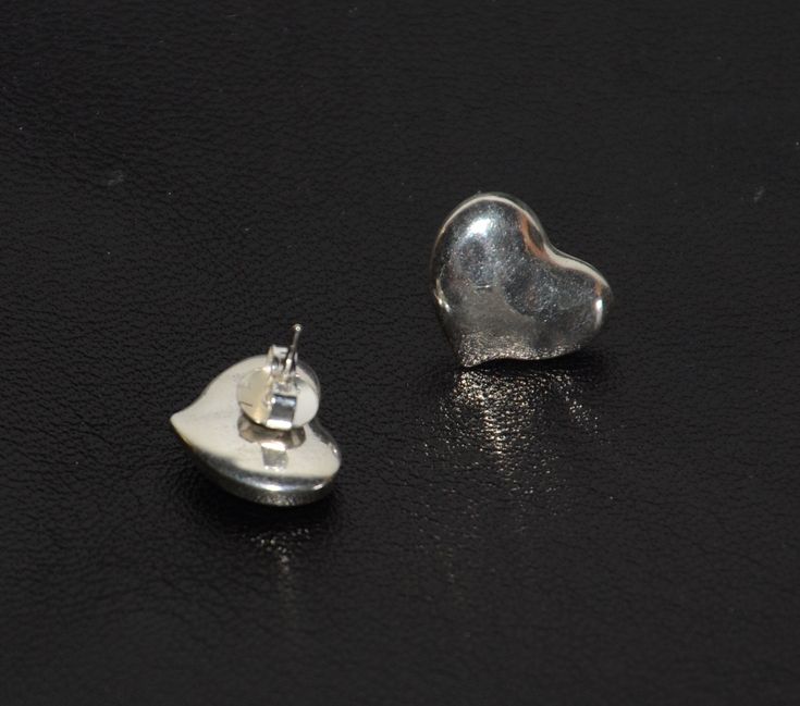 A pair of small heart stud earrings.  Stylish earrings.  Weight: less than 10g Package: gift box Classic Heart Earrings For Gift, Pierced Ears, Classic Heart Earrings As Gift, Classic Heart-shaped Earrings For Gift, Silver Double Heart Classic Earrings, Classic Silver Pierced Heart Earrings, Silver Classic Double Heart Earrings, Classic Silver Double Heart Earrings, Silver Heart Plug Earrings Gift, Classic Sterling Silver Heart Earrings For Gift