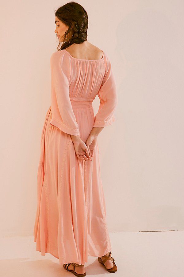 Romantic and ethereal, this sweet maxi from our free-est collection is a true versatile staple. **Fit:** Billowy throughout with cinched waist **Features:** V-neckline, smocked paneling at bodice, exaggerated sleeves, embroidered lace piecing at the skirt **Why We ❤ It:** Timeless with a sleek heel or laid back with simple flats, this style has endless ways to wear. | Dixie Maxi Dress by free-est at Free People in Pink, Size: S Feminine Floor-length Ruched Maxi Dress, Feminine Smocked Bodice Maxi Dress, Feminine Ruched Floor-length Maxi Dress, Elegant Pink Maxi Dress With Smocked Back, Flowy Maxi Dress With Gathered Waist, Feminine Ruched Maxi Dress For Brunch, Flowy Maxi Dress With Gathered Waist For Brunch, Exaggerated Sleeves, Pink Fits