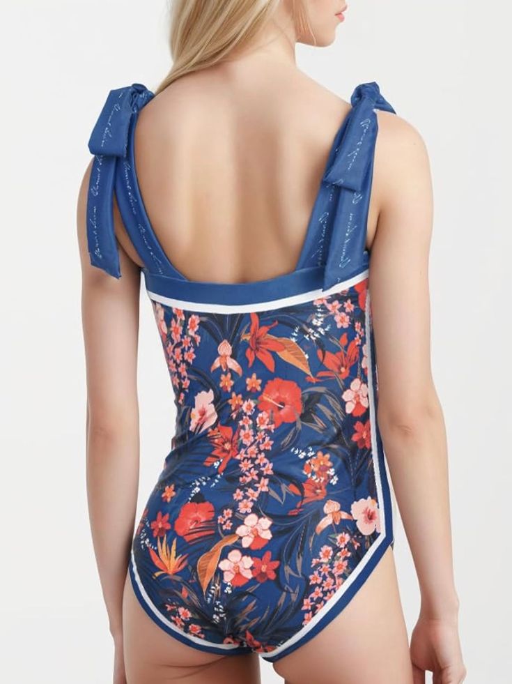 If you are a girl who loves to always be in fashion, even on those summer days, where we like to go to the beach. You can't stop carrying a swimsuit of the latest trends in your suitcase. This beautiful reversible one piece swimsuit is impressive, floral romantic printed. It has a high-cut, many ways to wear and tied gives to you different looks. It is made in a soft 82% polyester and 18% elastane. You will get an ultra chic look if you have a beach event. Adjustable shoulder straps bathing suit. Tied. Color may be lighter or darker depending of the device it is displayed. Beachy Lined Swimwear For Summer, Nylon Summer Swimwear For Spring, Spring Summer Nylon Swimwear, Nylon Beachwear Swimwear For Spring, Spring Tie-back Swimwear, Beachwear Swimwear For Beach Season Travel, Spring Pool Nylon Tankini, Beachwear For Travel During Beach Season, Travel Beachwear For Beach Season