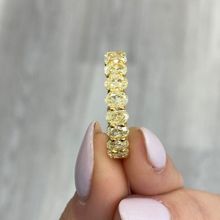 Fancy Yellow Oval Diamond Eternity Band VS-VVS Clarity Handmade in NYC Set in 18K Yellow Gold Available from 4 to 7 carats total. Ready to ship in 2-3 weeks Luxury Yellow Gold Ring Jewelry, Oval Diamond Cut White Gold Eternity Band, Oval Diamond Cut Eternity Band, Luxury Gia Certified Round Eternity Band, Oval Diamond White Eternity Band For Formal Occasions, Oval Eternity Band With Prong Setting For Formal Occasions, Luxury Eternity Band Gift, Oval Brilliant Cut Cubic Zirconia Eternity Band, Oval Cubic Zirconia Eternity Band With Brilliant Cut