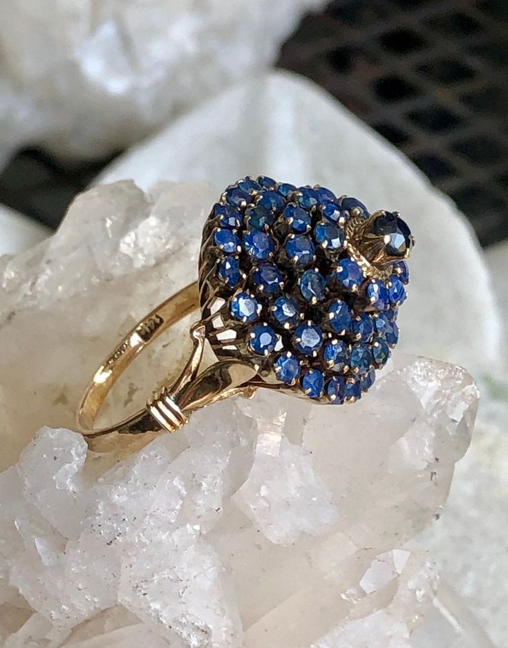 Stunning Circa 1930s Blue Sapphire 14kt Gold Vintage Antique Ring Ring Size 7 weighs 7 grams of gold and gemstones Antique Blue Oval Diamond Ring, Blue Multi-stone Sapphire Ring In Art Deco Style, Antique Blue Diamond Ring For Formal Occasions, Antique Sapphire Ring With 17 Jewels, Antique Blue Diamond Ring For Anniversary, Vintage Blue Cluster Ring With Center Stone, Sapphire Cluster Ring With 17 Jewels, Blue Vintage Cluster Ring With Center Stone, Heirloom Blue Sapphire Cluster Ring