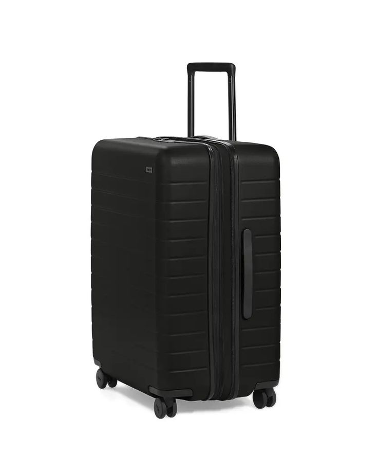 The 10 Best Expandable Suitcases | SmarterTravel Big Suitcases, Hidden Laundry, Premium Luggage, Stylish School Bags, Large Suitcase, Best Carry On Luggage, Luggage Brands, Checked Luggage, Baggage Claim