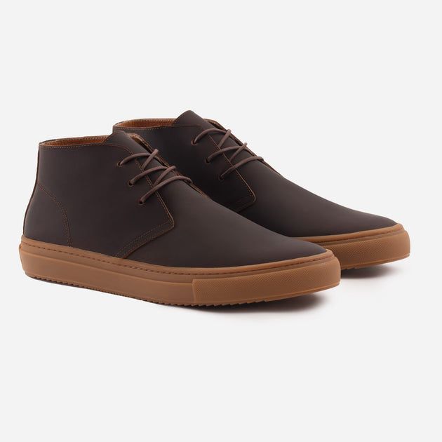 Brown High-top Chukka Boots For Business, Casual Low-top Chukka Boots With Leather Sole, Casual Leather Lace-up Boots With Contrast Sole, Classic Leather Chukka Boots With Contrast Sole, Leather Low-top Lace-up Boots With Vibram Sole, Brown Leather High-top Sneakers For Fall, Business High-top Chukka Boots With Leather Sole, Modern Low-top Boots With Leather Sole, Leather Chukka Boots With Contrast Sole