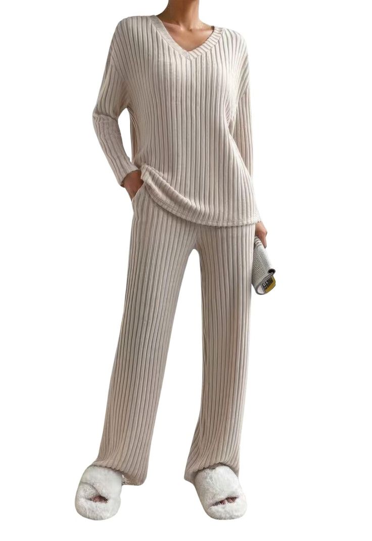 PRICES MAY VARY. Fall Lounge Sets, including one pullover sweater and straight leg pants, ribbed knit fabric. They are made of premium polyester, soft and skin-friendly, warm, lightweight, no pilling and smell, cozy to wear. Feature: 2 Piece fall winter lounge outfits, knitted sweater lounge sets, solid v-neck long sleeve pullover top and wide leg long trousers, casual loose matching outfits, soft cozy sleepwear, pajamas set. The clean and streamlined cut perfectly creates your fashion style. Ri Lounge Wear Sets, Womens Pjs, Clothes Pants, Leisure Suit, Winter Pajamas, Long Sleeve Jumper, Gray Pants, Womens Pyjama Sets, Suit Fabric