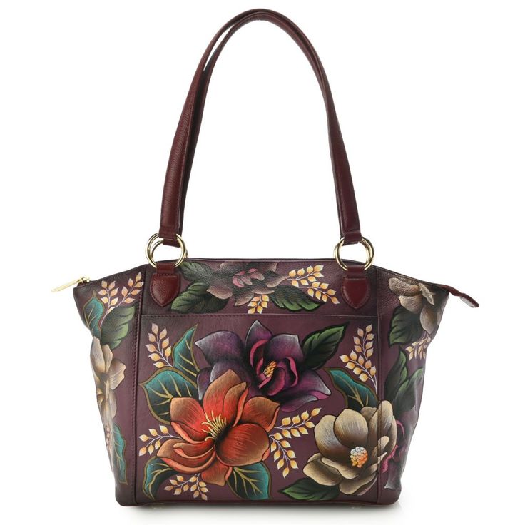 Beautiful Anuschka artwork can be found on the exterior of this medium sized tote bag. Plentiful pockets can be found within the top=zipped entry to the main compartments, allowing organization of your day-to-day essentials. With its spacious size and delightful appearance, this tote is sure to become a fast favorite in your handbag collection. Hand Painted Handbags, Hand Painted Satchel Bag For Everyday Use, Hand Painted Rectangular Travel Bag, Hand Painted Rectangular Bag, Rectangular Hand Painted Travel Bag, Hand Painted Tote Bag For Daily Use, Hand Painted Shoulder Bag For Travel, Hand Painted Rectangular Satchel, Hand Painted Tote Shoulder Bag For Daily Use