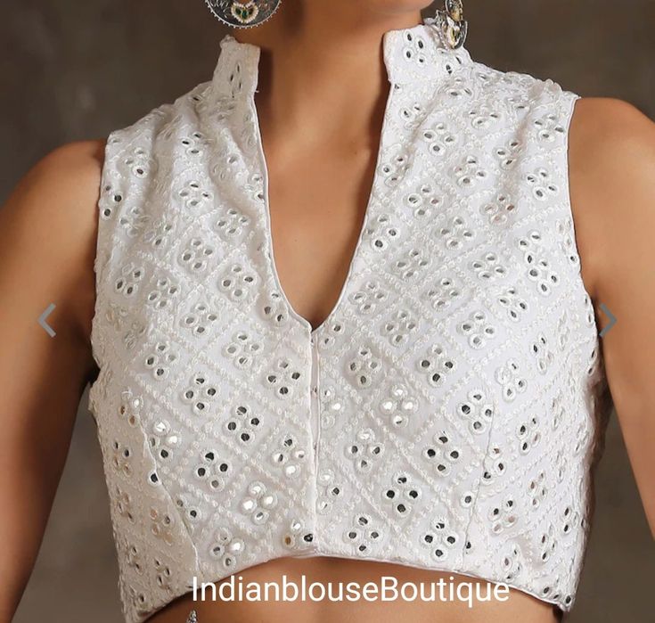 "Indian Designer Brcoade silk Blouse, Wedding blouse ,handmade blouse Thanks for visit !! 1) Readymade Saree blouse - ready to wear 2) Back open  3) Regular cut 4) Soft, lightweight and breathable fabric. If you could include the following info in the note to whenever you placed the order, you will get best-matched blouse * Chest size: * Waist size: * Blouse Length: * Armhole: * Sleeve Loose: * Sleeve Length: * Front Neck length: * Back Neck length: IF YOU DON'T FIND YOU SIZE HERE, PLEASE MESSAGE US. WE WILL MAKE ONE FOR YOU. 6) We usually ship within 3-5 working days after receiving clear payment, 7) We accept PayPal and deliver via DHL, Aramax, USPS, India Post Registered Airmail (Economy Shipping Service). This can be upgraded with Express service via FedEx (delivery within 7 to 10 days White Blouse With Chikankari Embroidery For Reception, White Chikankari Embroidery Blouse For Reception, White Blouse With Cutdana For Reception, Elegant Navratri Choli With Chikankari Embroidery, Elegant Blouse With Chikankari Embroidery For Reception, Wedding Blouse With Chikankari Embroidery, Elegant Chikankari Embroidery Blouse For Reception, Designer White Tops With Cutdana, Designer White Cutdana Tops