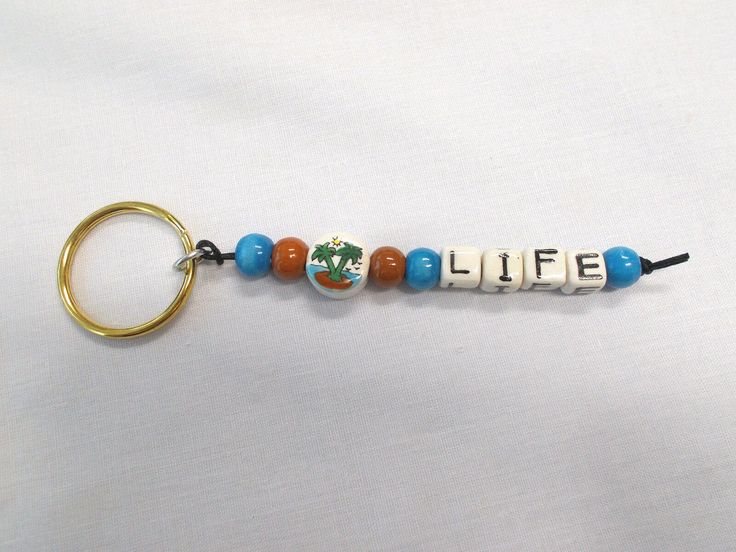 a keychain with the word life spelled in beads