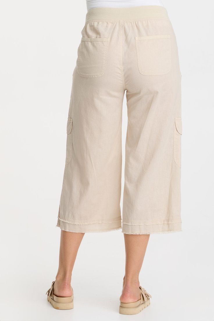 In breathable Cotton Linen, BirkÕs elastic waistband features rib contrast and a drawstring, twill tape-edged front and back pockets, an antique brass bell zipper and matching eyelet details on the front pockets. Cotton Linen: 55/45 Linen/Cotton. 2x1 Rib Waistband: 95/5 Cotton/Spandex Inseam: ~22" Front Rise: ~11.75 Back Rise: ~17.5" Waistband: Drawstring Color Description: Soft cream khaki Preshrunk Machine washable Imported MODEL Veronica is wearing size Small Height: 5'10" | Bust: 34B | Waist Skirt Crop, Brass Bell, Tunic Shirt, One Piece Dress, Fashion Colours, Black Charcoal, Twill Tape, Cropped Leggings, Jacket Tops