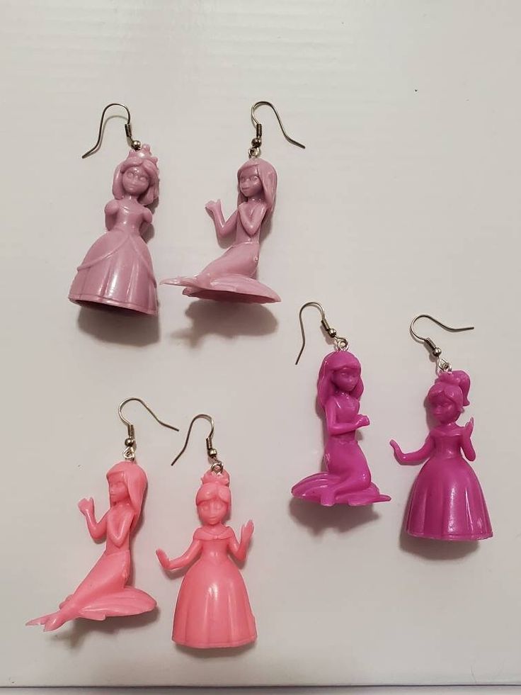 Handcrafted from plastic princess and mermaid figures, available in 3 different colors. Pink Plastic Party Earrings, Pink Plastic Earrings For Party, Mermaid Figures, Mermaid Moon, Moon Silhouette, Fairy Artwork, Aventurine Stone, Mermaid Earrings, Rainbow Necklace