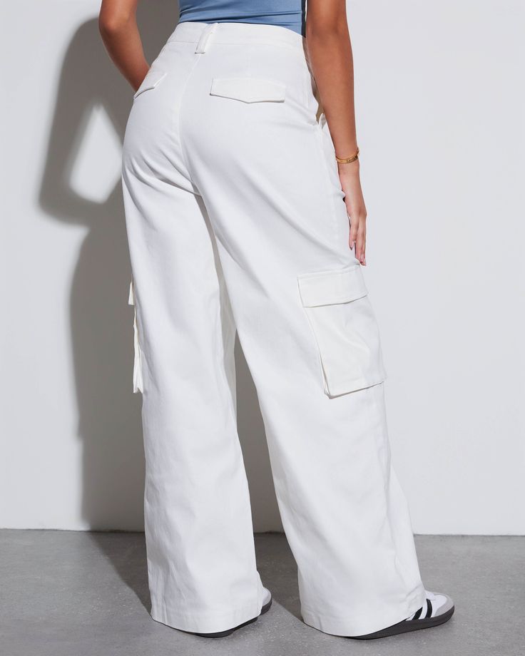 Combine the look of a tailored trouser with the laidback approach of baggy cargo pants and you'll get the Jacklin Cargo Trouser Pants. This pair sits high on the waist and features a wide leg fit. Dress it up or down your way. High rise Fitted waist Wide pant leg Side, back & cargo pockets Front zip fly & button closure 97% Cotton 3% Spandex Runs Large Wide Leg Cargo Parachute Pants, Relaxed Fit Wide Leg Bottoms With Multiple Pockets, Utility Style High-waisted Wide Leg Pants With Multiple Pockets, Baggy Wide-leg Cargo Jeans For Workwear, Wide Leg Parachute Pants With Multiple Pockets For Work, Relaxed Fit Cargo Wide Leg Pants, Utility High-waisted Wide Leg Pants With Cargo Pockets, Utility Wide Leg Work Pants With Side Pockets, Relaxed Fit Wide Leg Bottoms With Cargo Pockets