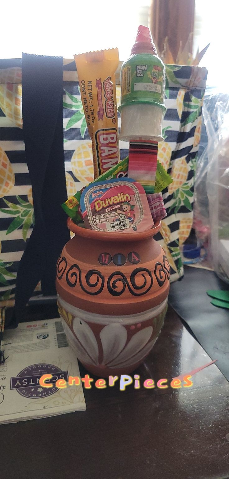 ●Buy the taza de Cafe 
●I used bamboo sticks and foam inside the coffee mug 
● Buy the most common mexican candies and add 
Very easy Easy Centerpieces, Mexican Decorations, Simple Centerpieces, Mexican Decor, Mexican Party, Party Centerpieces