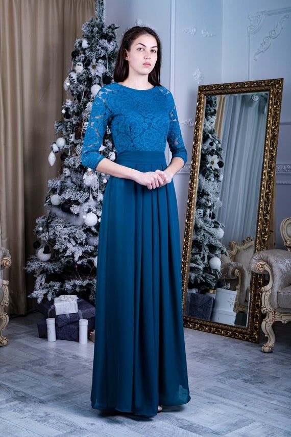 - Teal color dress for bridesmaids- Thanks to modesty is good as mother of the Bride outfit- Stretchy floral lace on top- Stretchy lining under the lace- Flowy chiffon skirt with pleats- Thick satin non-see-through lining on skirt- Zipper in side seam- 3/4 length Raglan sleeves- Removable chiffon sash- Length 150 cm (59 inches) fits as floor length for 5'7'' (170 cm)- Custom length available, plus sizes and maternity versions (up to 55 inches in bust), junior bridesmaid sizes available without e Bridesmaid Evening Dress With Illusion Neckline And Fitted Bodice, Elegant Lace Bridesmaid Dress With Sweep Train, Fitted Illusion Neckline Dress For Bridesmaids, Fitted Illusion Neckline Bridesmaid Dress, Fitted Bridesmaid Dress With Illusion Neckline, Fitted Lace Bridesmaid Dress For Evening, Formal Dress With Lace Top And Fitted Bodice, Floor-length Evening Dress With Lace Back For Bridesmaid, Floor-length Lace Back Evening Dress For Bridesmaid